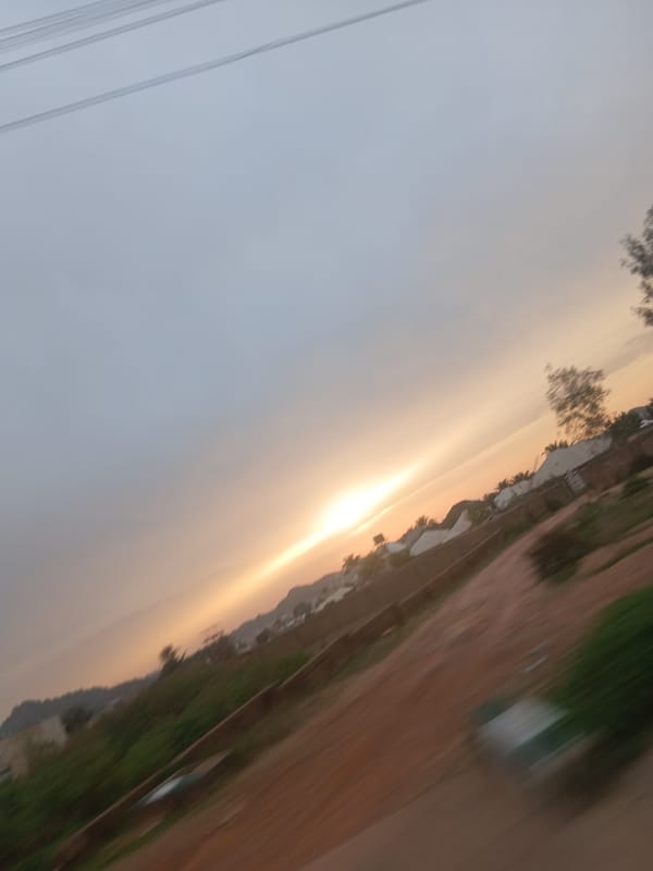 Sunset observed over vegetation landscape in Bukuru, Nigeria