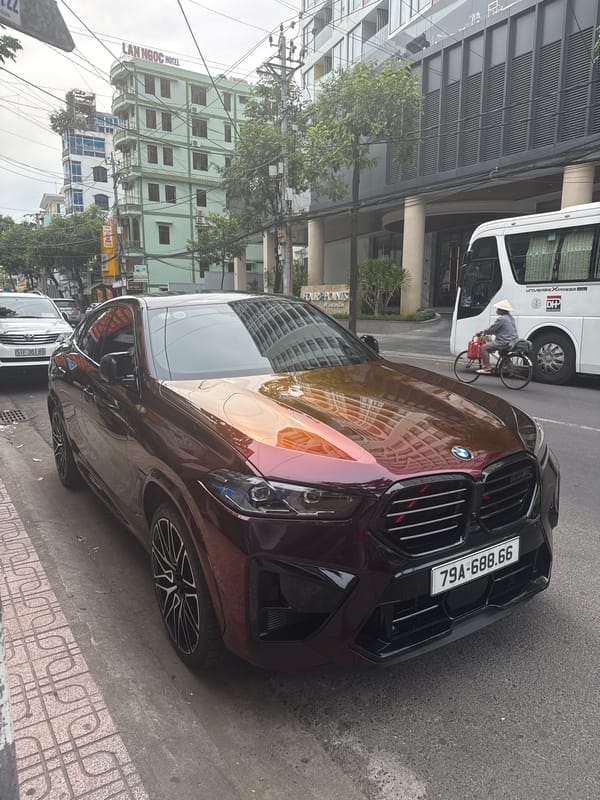 BMW X6 spotted parked on Nha Trang sidewalk amid morning traffic