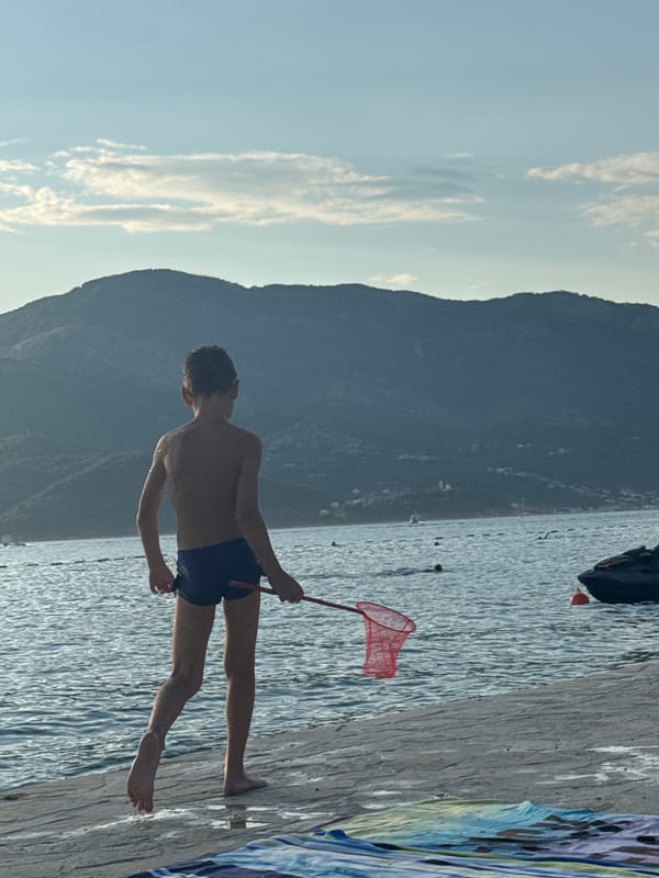 Lazy beach afternoon with snorkeling, lounging, and golden-hour light.