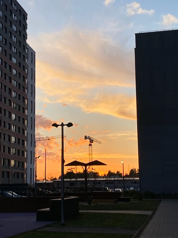 Vibrant sunset illuminates Saint Petersburg's modern skyline