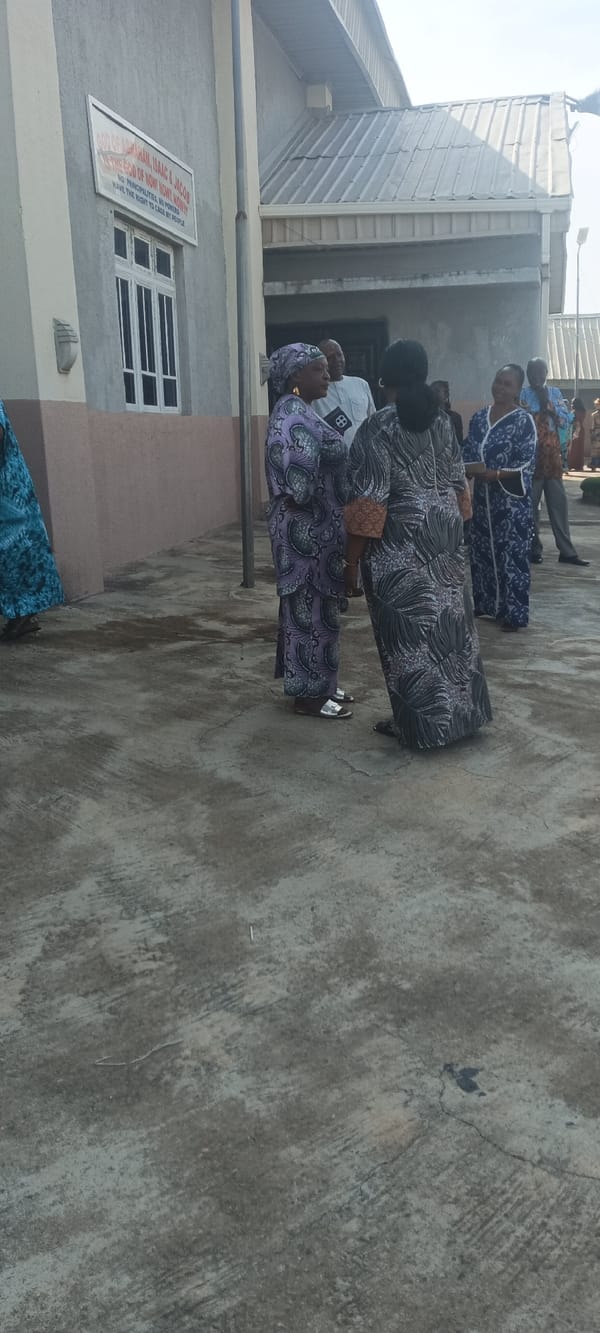 Community gathering at international venue in Jos, Nigeria