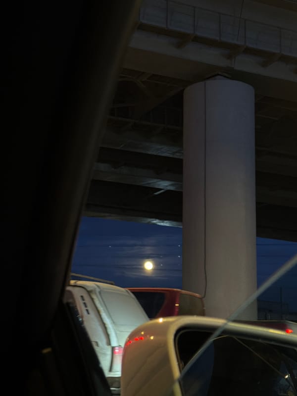 White van parked under bridge in Moscow
