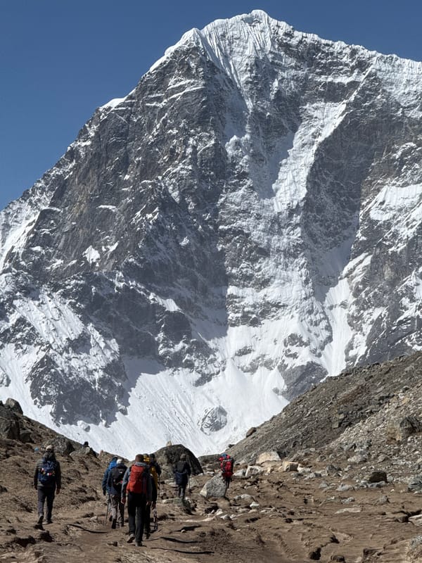 Trekking group spotted on mountain trail in Khumjung, Nepal