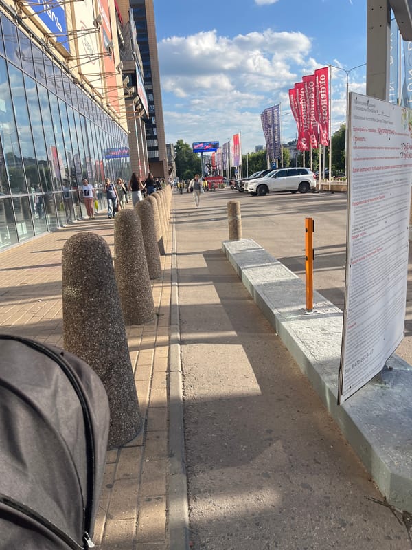 Modern shopping mall exterior on a sunny Voronezh afternoon
