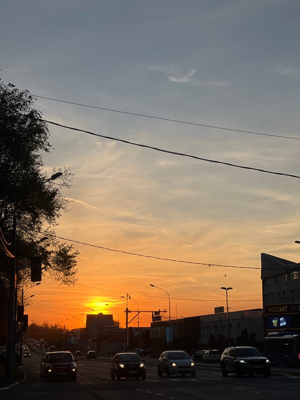 Evening traffic scene captured at sunset in Belgrade suburb