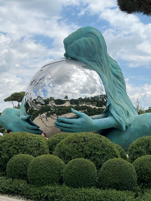 Teal sculpture with mirrored sphere in Krasnodar