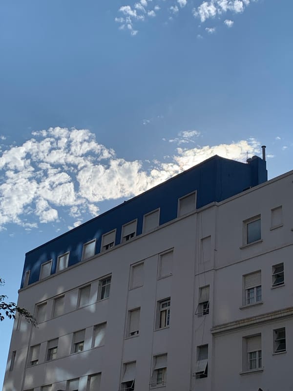 Tall building photographed against cloudy sky in Buenos Aires