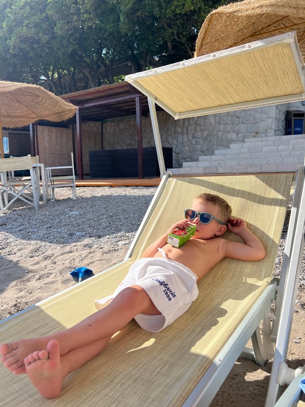 Beachgoers document leisurely afternoon moments at Prijevor, Montenegro resort