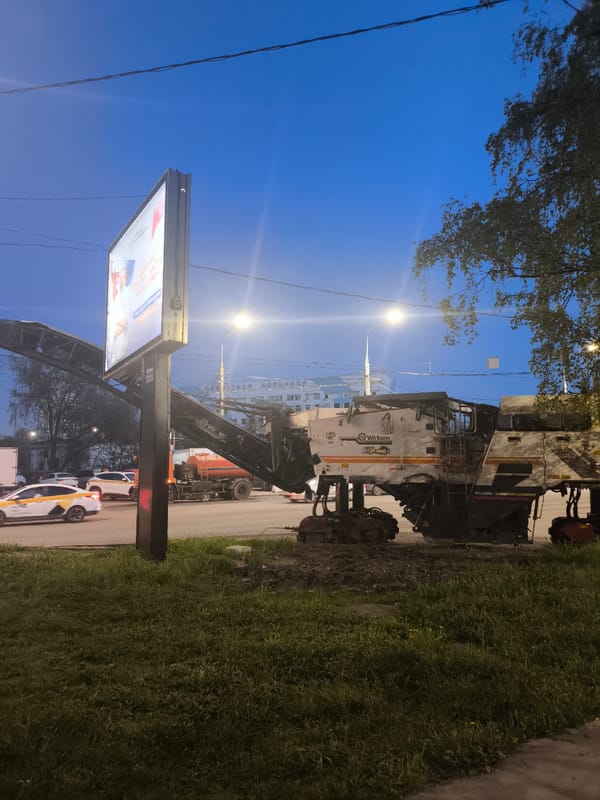 Construction equipment spotted on roadside in Khimki at dusk