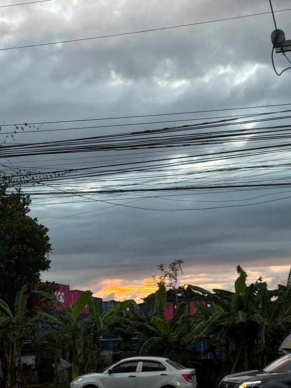 Motorcyclist documents evening ride through Davao City at sunset