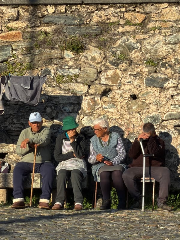 Afternoon tourists explore historic Bragança, Portugal walkways and attractions