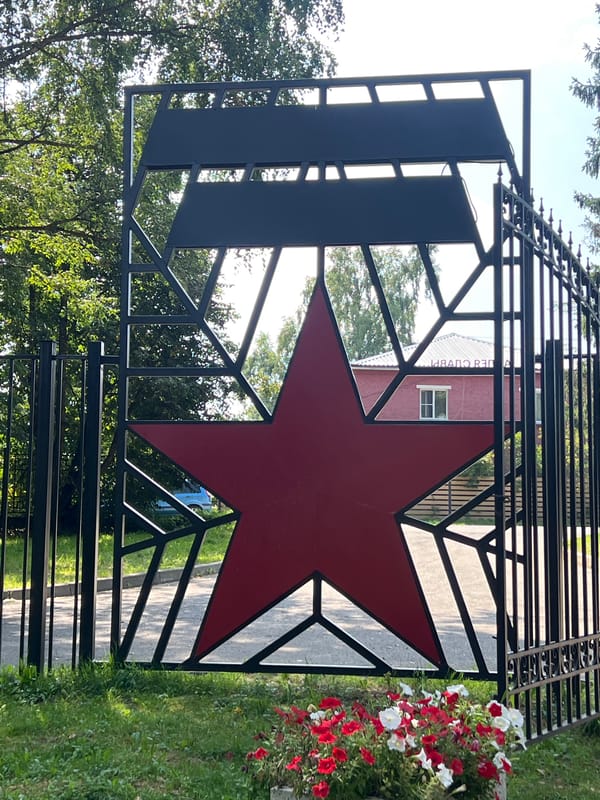 Taldom's civic park: Soviet gate, fountain, and cypress promenade