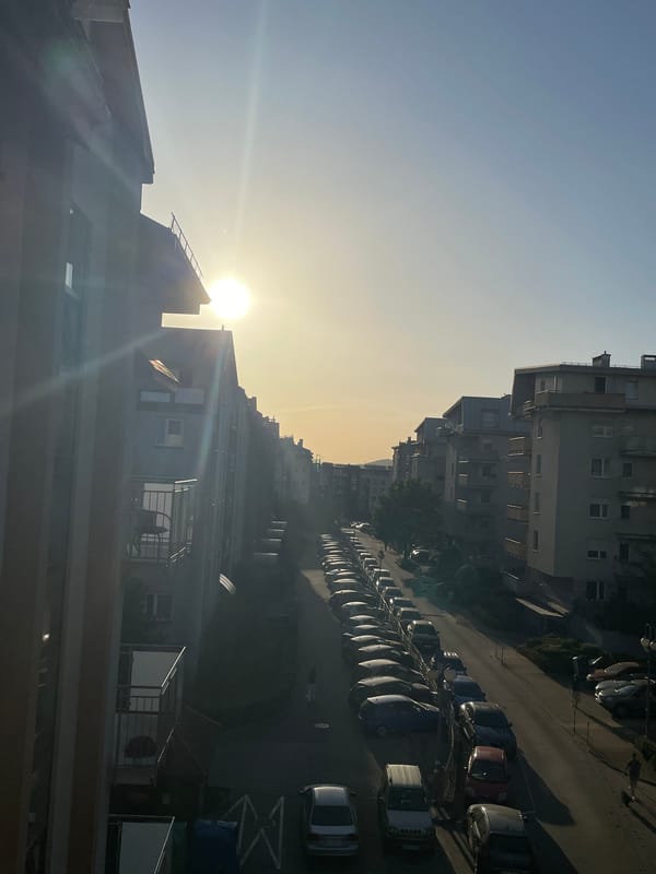 Urban sunset street scene captured from elevated position