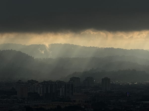 Hazy conditions blanket Kuala Lumpur skyline early morning