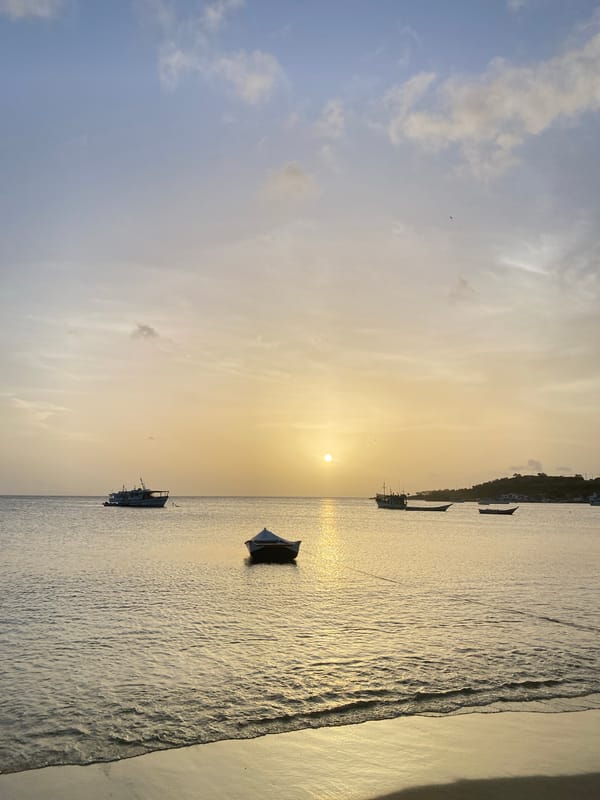 Golden hour on the Juan Griego waterfront, boats and all.