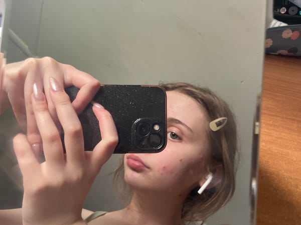 Morning selfie session in a bedroom in Ashkadar, Russia