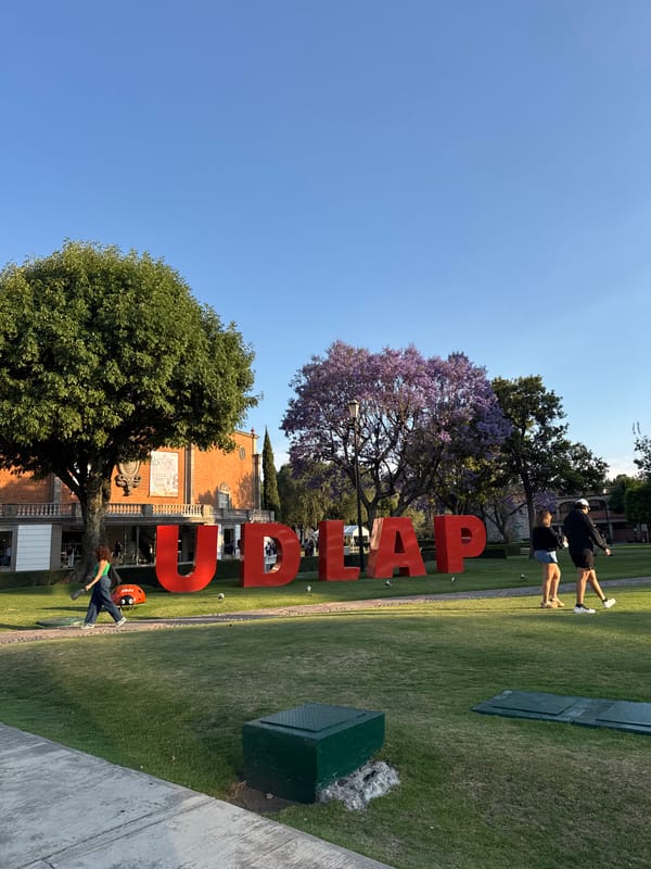 Five people pose for group photo in San Andrés Cholula