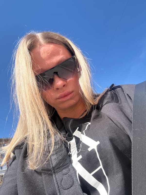 Woman takes selfies in Perm on clear morning