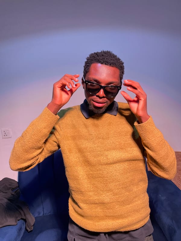 Man with sunglasses captured in casual indoor moments