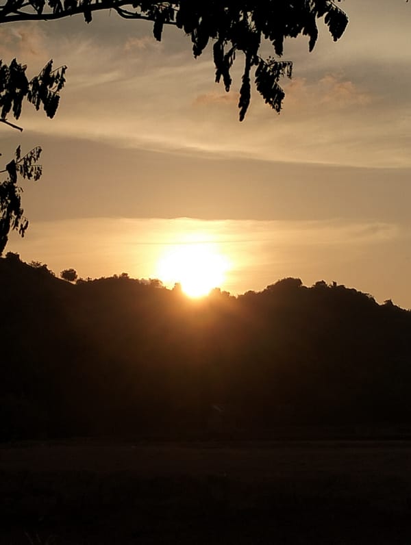 Golden sunrise illuminates Lhokseumawe mountains, Indonesia
