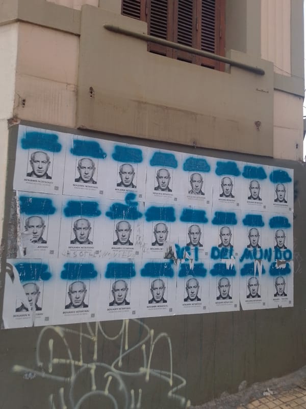 Netanyahu posters vandalized on Asuncion walls amid street art