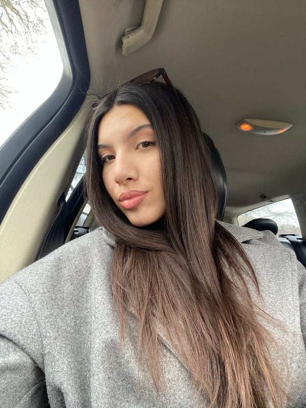 Woman photographed inside car in Bälinge, Sweden