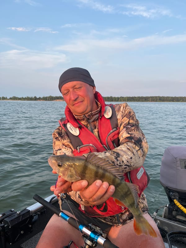 Fishing trip on choppy Russian waters, catches weighed and logged