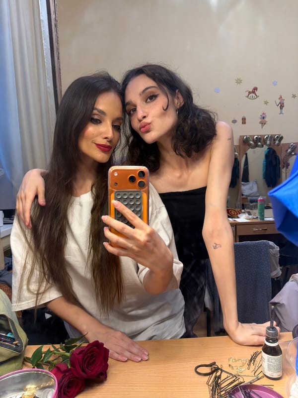 Mirror selfies and roses in a Ufa dressing room