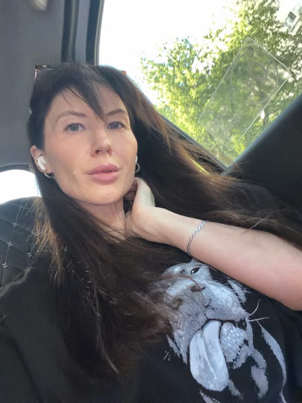 Woman takes selfies in vehicle in Perm, Russia