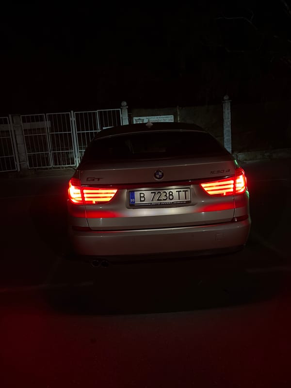 Nighttime drive documented through Kazanlak, Bulgaria in BMW sedan