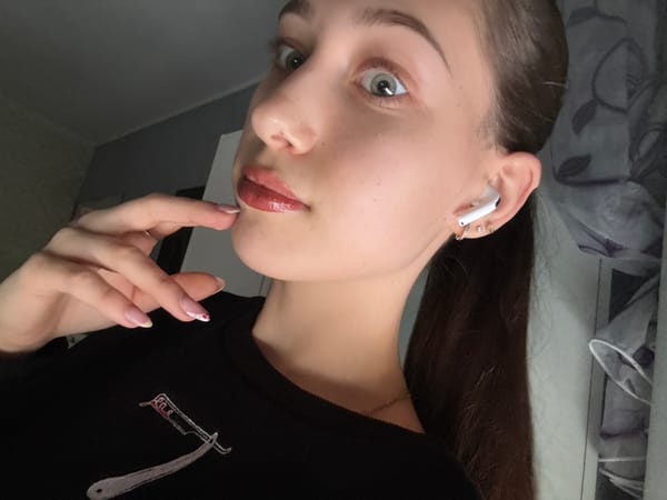 Woman takes selfies in Sofia apartment Friday afternoon
