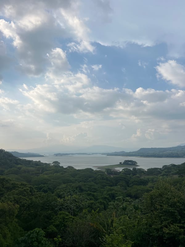 Tourist documents scenic Suchitoto landscapes and Los Tercios waterfall