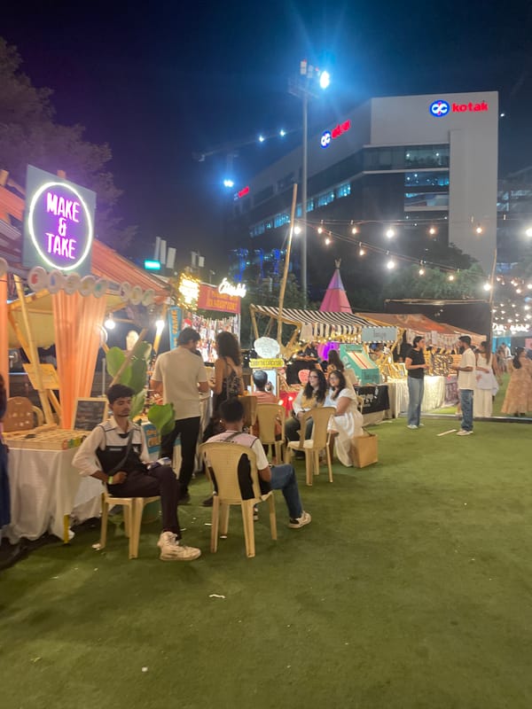Night jewelry vendor operates illuminated market stall in Mumbai