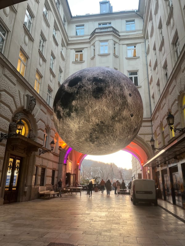 Moon replica art installation displayed in Budapest courtyard