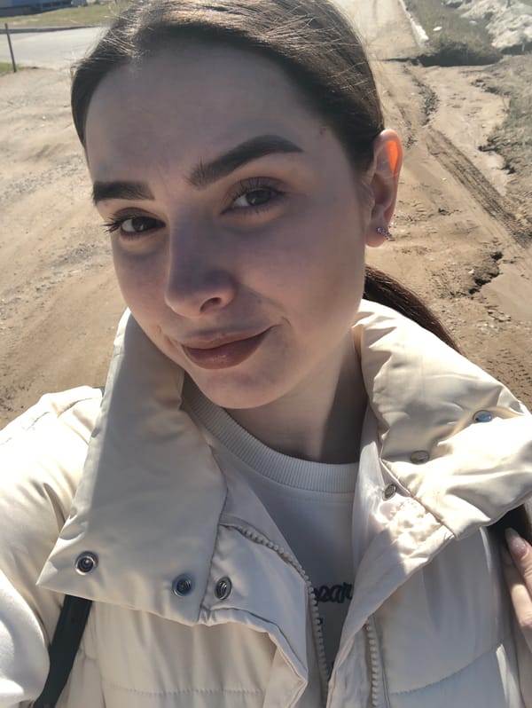 Young woman photographed in casual portraits in Noviy, Russia