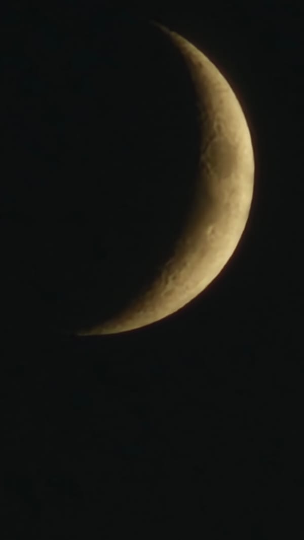Crescent moon over Yekaterinburg, framed three ways at dusk