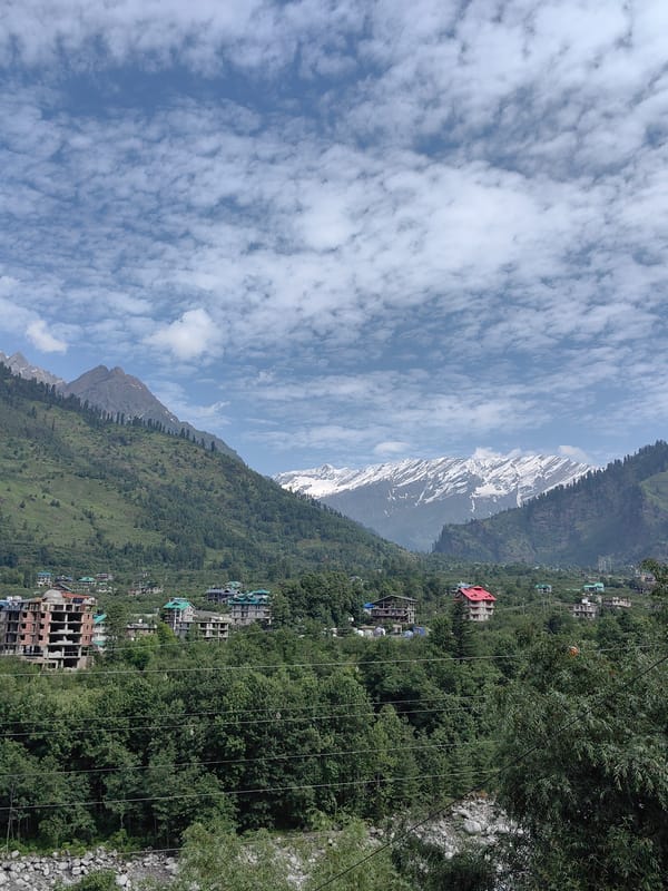 Village life and construction activity in Himachal Pradesh's Kullu Valley