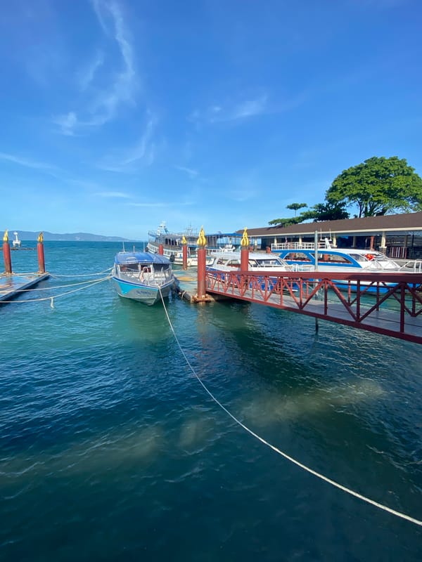 Boats docked at Thai pier captured in early morning