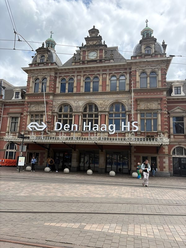 Tourist documentation captures The Hague's architectural contrasts near central station