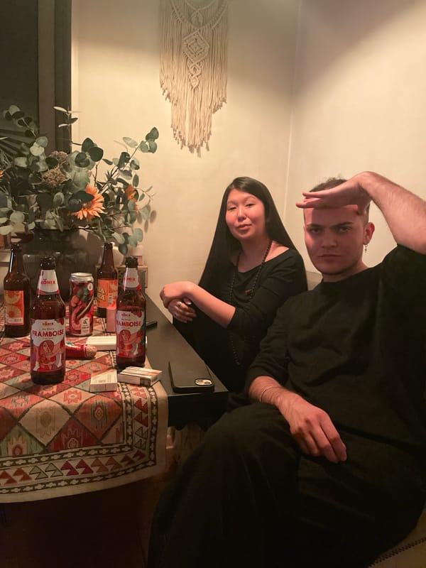 Two people photographed indoors in Abakan, Russia