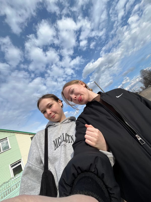 Two women photographed outdoors in Sosново, Russia