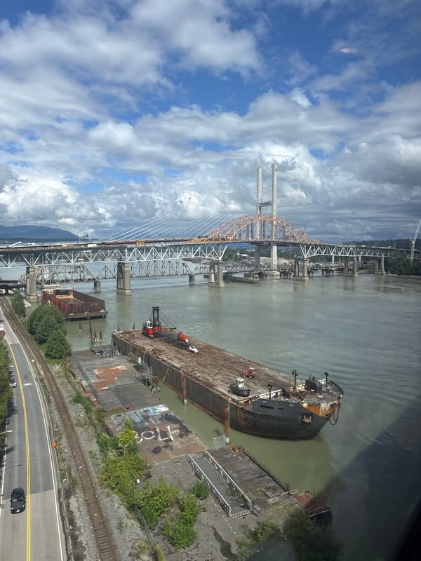 Fraser River and its bridges seen from a moving train, New Westminster