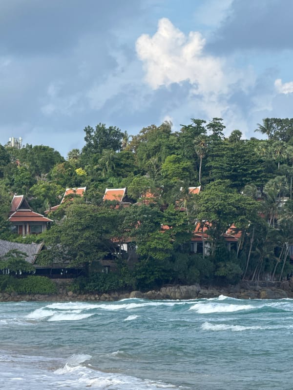 Morning at Karon Beach — surf, sand, and hillside views