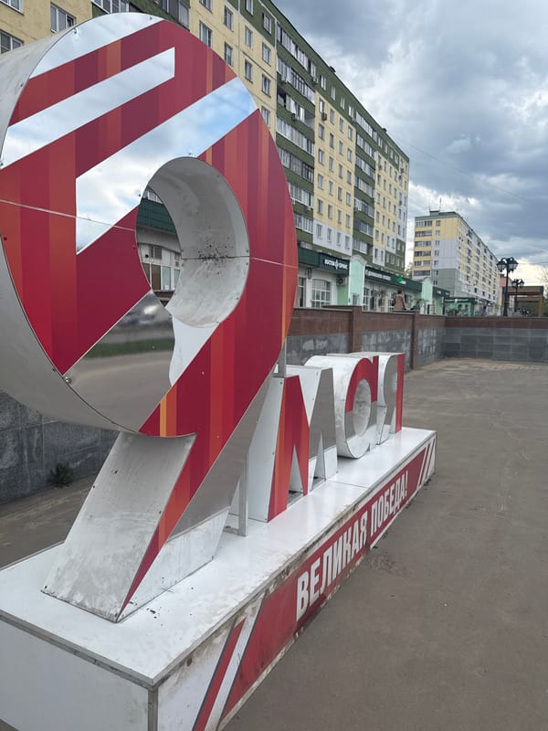 Morning scenes from Dmitrov include Victory Day displays, construction