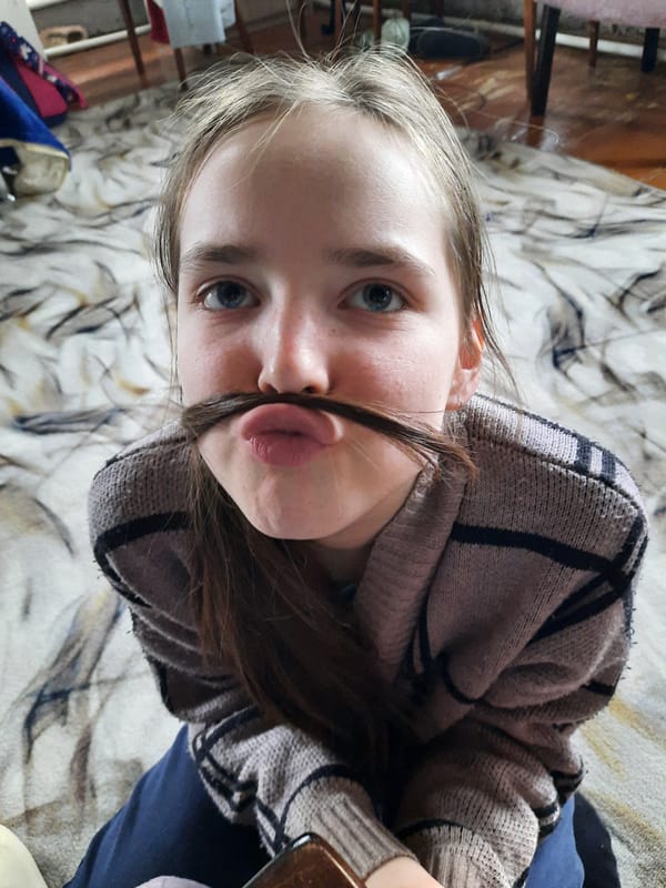 Everyday moments captured in Krasnogorskoye: pets, church, playful portraits