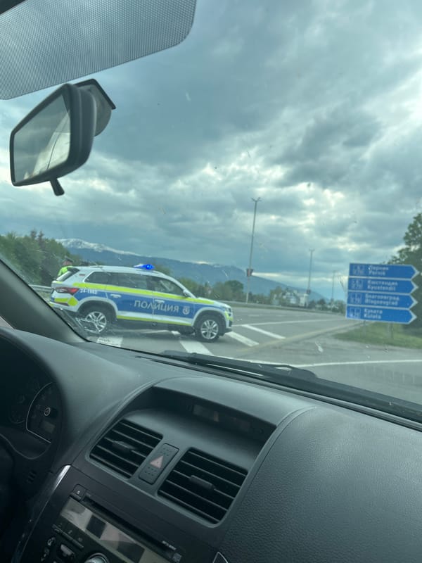 Police vehicle spotted with blue light activated near Lozen