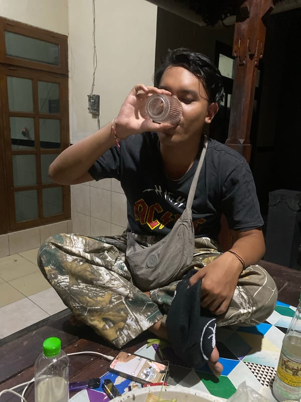 Laid-back afternoon drink on a wooden table in North Kuta
