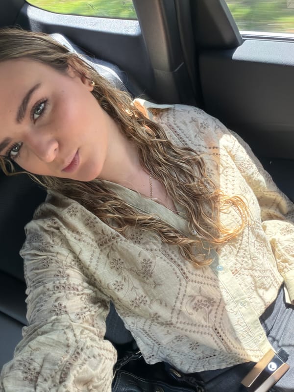 Woman takes car selfie in Key Biscayne