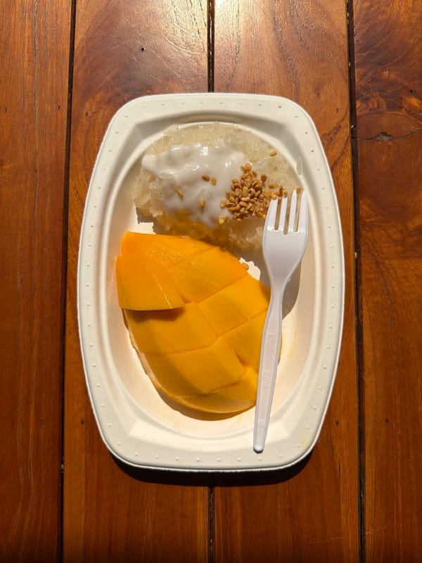 Late-night mango sticky rice documented in Bangkok
