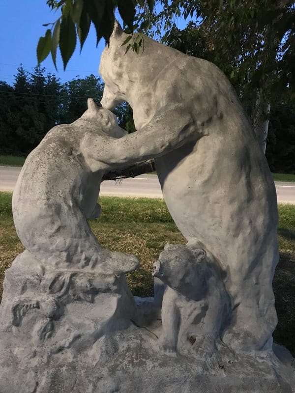 Evening scenes documented in Lanivtsi, Ukraine including lion sculpture